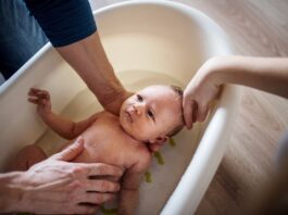 bathing a baby