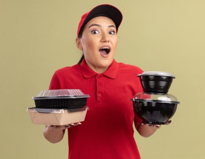 woman hand holding Microwavable Boxes