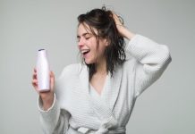 smile woman and hand holding shampoo