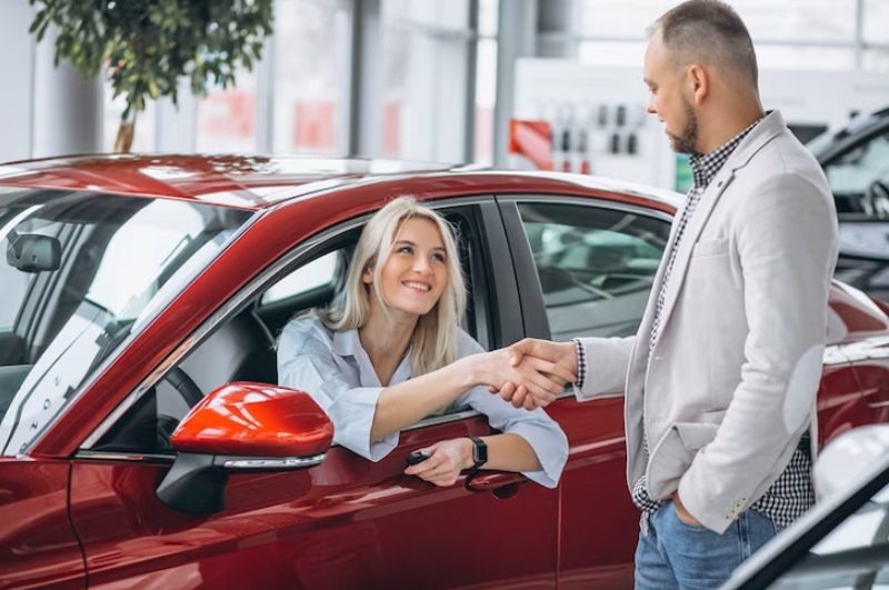 girl buying a pre-owned car