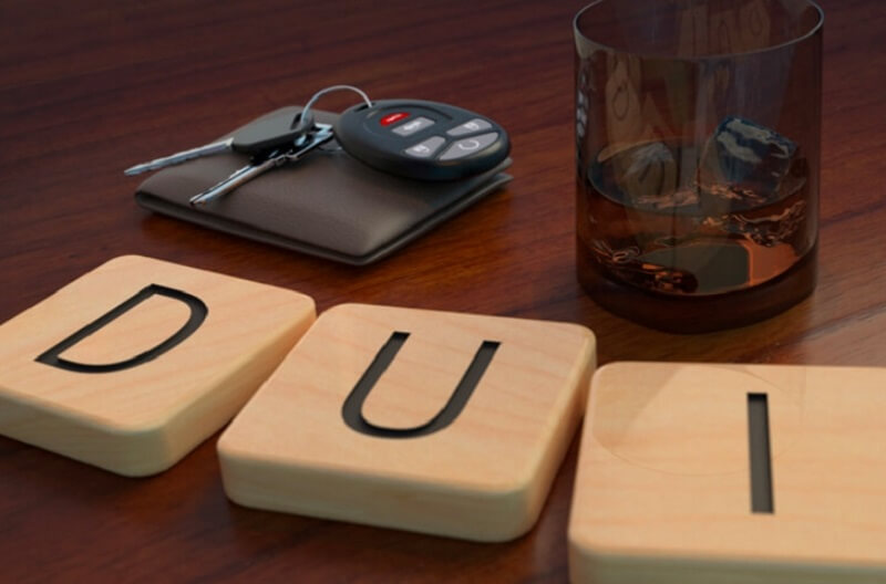 DUI with voilet car keys and other things on the table
