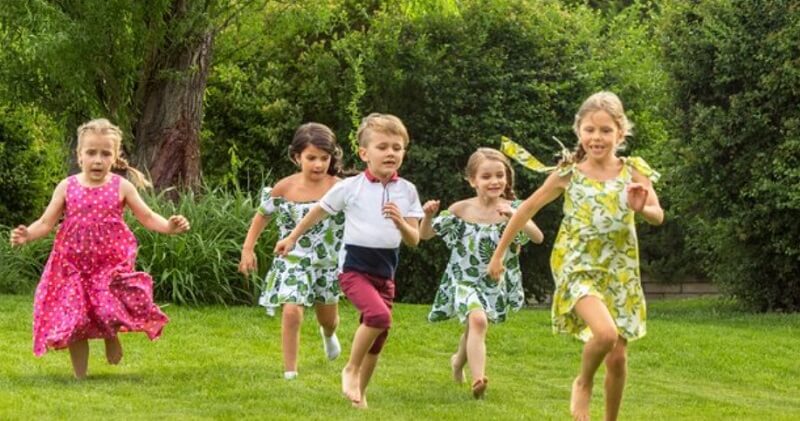 children running and smiling